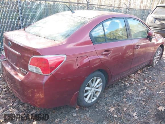 ✅ 2012 Subaru Impreza Premium • VIN: JF1GJAC67CH003331 • Lot: 43816429. Listed on IAAI with 243,810 mi. Free auction sales archive from the USA and detailed vehicle history report at DreamBid. Image 4.