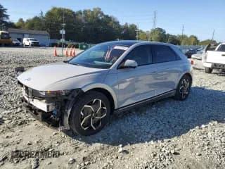 ✅ 2023 Hyundai Ioniq 5 Limited • VIN: KM8KR4AE2PU215703 • Лот: 82220385. Опубликован ранее на Copart с пробегом 29 632 миль. Бесплатный доступ к архиву аукционных продаж из США и подробный отчёт об истории автомобиля на DreamBid. Изображение 1.