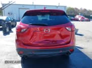 ✅ 2014 Mazda CX-5 Touring • VIN: JM3KE4CY1E0333406 • Lot: 43266877. Wystawiony na IAAI z przebiegiem 164 363 mil. Bezpłatny archiwum sprzedaży aukcyjnych z USA i szczegółowy raport historii pojazdu na DreamBid. Zdjęcie 16.