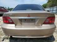 ✅ 2000 Mitsubishi Galant ES • VIN: 4A3AA46G1YE023862 • Lot: 61449105. Wystawiony na Copart z przebiegiem 206 364 mil. Bezpłatny archiwum sprzedaży aukcyjnych z USA i szczegółowy raport historii pojazdu na DreamBid. Zdjęcie 6.