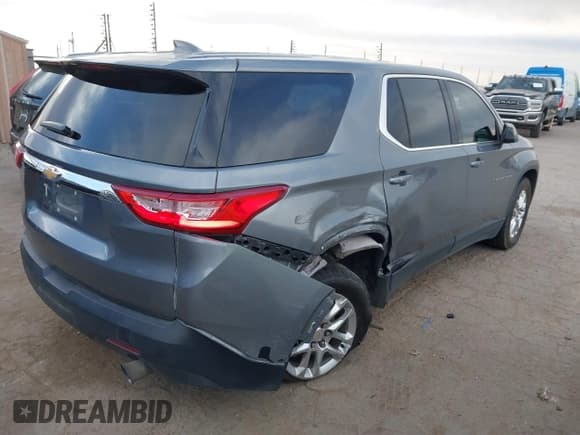 ✅ 2021 Chevrolet Traverse LS • VIN: 1GNERFKW2MJ201129 • Lot: 41769338. Listed on IAAI with 89,807 mi. Free auction sales archive from the USA and detailed vehicle history report at DreamBid. Image 4.
