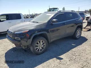 ✅ 2014 Jeep Cherokee Limited • VIN: 1C4PJMDS1EW130422 • Lot: 63490115. Listed on Copart with 157,265 mi. Free auction sales archive from the USA and detailed vehicle history report at DreamBid. Image 1.