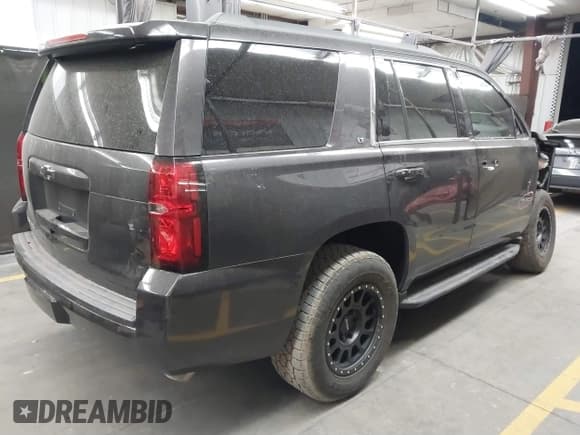 ✅ 2018 Chevrolet Tahoe LT • VIN: 1GNSCBKC5JR290050 • Lot: 41569159. Listed on IAAI with 60,429 mi. Free auction sales archive from the USA and detailed vehicle history report at DreamBid. Image 4.