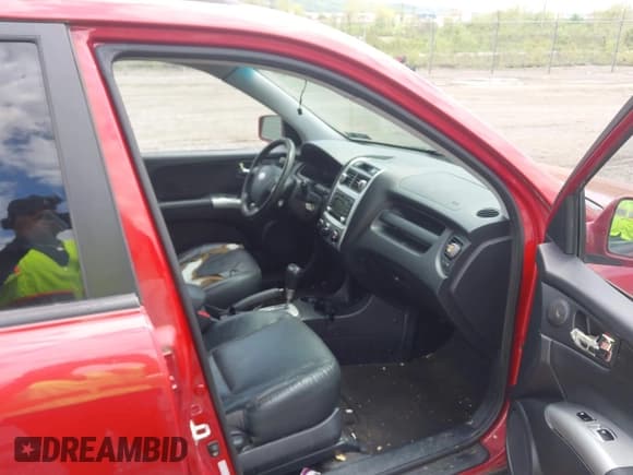 ✅ 2009 Kia Sportage LX • VIN: KNDJE723597634012 • Lot: 42188447. Wystawiony na IAAI z przebiegiem 205 040 mil. Bezpłatny archiwum sprzedaży aukcyjnych z USA i szczegółowy raport historii pojazdu na DreamBid. Zdjęcie 5.