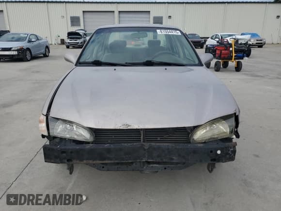 ✅ 1999 Toyota Corolla LE • VIN: 1NXBR12E6XZ148570 • Лот: 81554415. Опубликован ранее на Copart с пробегом 264 960 миль. Бесплатный доступ к архиву аукционных продаж из США и подробный отчёт об истории автомобиля на DreamBid. Изображение 5.