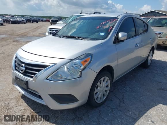 ✅ 2018 Nissan Versa SV • VIN: 3N1CN7AP2JL801264 • Лот: 42679723. Опубликован ранее на IAAI с пробегом 120 715 миль. Бесплатный доступ к архиву аукционных продаж из США и подробный отчёт об истории автомобиля на DreamBid. Изображение 2.