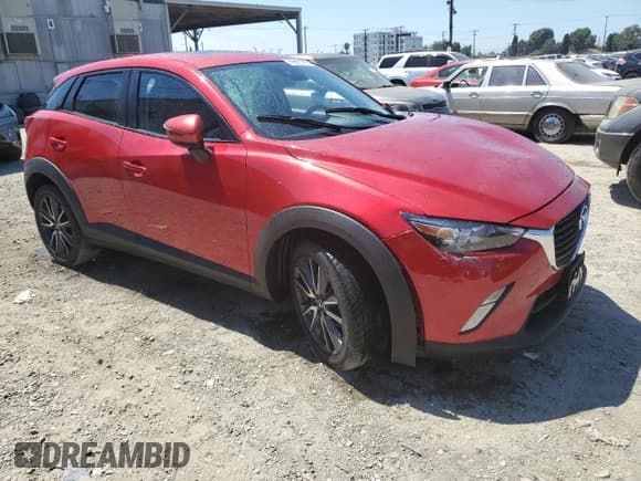 ✅ 2018 Mazda CX-3 Touring • VIN: JM1DKDC77J0329906 • Лот: 70503795. Опубликован ранее на Copart с пробегом 66 398 миль. Бесплатный доступ к архиву аукционных продаж из США и подробный отчёт об истории автомобиля на DreamBid. Изображение 4.