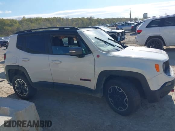 ✅ 2016 Jeep Renegade Trailhawk • VIN: ZACCJBCTXGPE07405 • Lot: 43590770. Listed on IAAI with 112,381 mi. Free auction sales archive from the USA and detailed vehicle history report at DreamBid. Image 12.