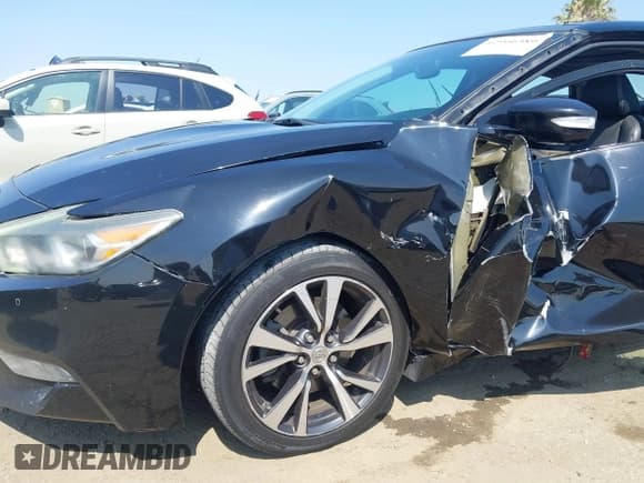 ✅ 2016 Nissan Maxima SR • VIN: 1N4AA6APXGC380558 • Лот: 42966389. Опубликован ранее на IAAI с пробегом 137 310 миль. Бесплатный доступ к архиву аукционных продаж из США и подробный отчёт об истории автомобиля на DreamBid. Изображение 18.