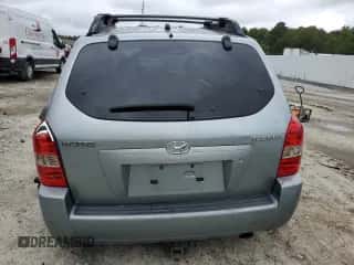 2005 Hyundai Tucson GL z VIN KM8JM12B65U184708, wystawiony jako Copart lot #73351044 z przebiegiem 209 563 mil mil oraz Szkoda całkowita • Salvage title. Historia ofert i sprzedaży dostępna na DreamBid. Obrazek 6.