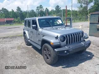 ✅ 2021 Jeep Wrangler Unlimited Sahara • VIN: 1C4HJXEN3MW628845 • Lot: 42438049. Listed on IAAI with 49,970 mi. Free auction sales archive from the USA and detailed vehicle history report at DreamBid. Image 1.