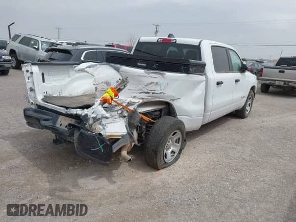 2022 Ram 1500 Tradesman z VIN 1C6SRFNT0NN416927, wystawiony jako IAAI lot #42019996 z przebiegiem 91 025 mil mil oraz . Historia ofert i sprzedaży dostępna na DreamBid. Obrazek 4.