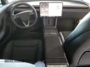 ✅ 2025 Tesla Model 3 Long Range • VIN: 5YJ3E1EA2SF047928 • Lot: 82538855. Listed on Copart with 3,041 mi. Free auction sales archive from the USA and detailed vehicle history report at DreamBid. Image 8.