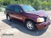 ✅ 2006 GMC Envoy SLE • VIN: 1GKDT13S362228877 • Lot: 42722097. Listed on IAAI with 202,574 mi. Free auction sales archive from the USA and detailed vehicle history report at DreamBid. Image 1.