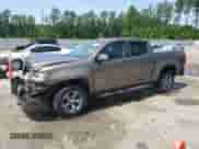 2017 Chevrolet Colorado 4WD Z71 z VIN 1GCGTDENXH1222200, wystawiony jako Copart lot #62007605 z przebiegiem 95 795 mil mil oraz Szkoda całkowita • Salvage title. Historia ofert i sprzedaży dostępna na DreamBid. Obrazek 1.
