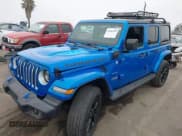 ✅ 2023 Jeep Wrangler Sahara • VIN: 1C4JJXP63PW579805 • Lot: 43401399. Listed on IAAI with 41,989 mi. Free auction sales archive from the USA and detailed vehicle history report at DreamBid. Image 2.