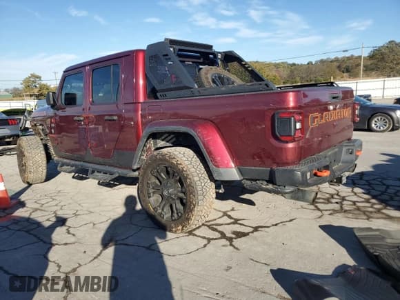 ✅ 2021 Jeep Gladiator Mojave • VIN: 1C6JJTEG9ML615571 • Lot: 91520245. Listed on Copart with 46,753 mi. Free auction sales archive from the USA and detailed vehicle history report at DreamBid. Image 2.