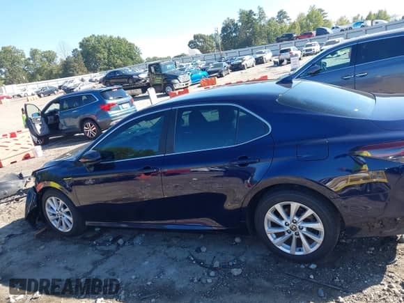 2021 Toyota Camry LE with VIN 4T1C11AK8MU461036, listed as a IAAI auction lot 43351796 with 83,856 mi miles and . Bid and sale history available at DreamBid. Image 14.