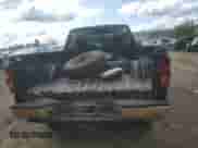 2004 Chevrolet Silverado 1500 Work Truck z VIN 1GCEK14V64Z133889, wystawiony jako Copart lot #67903994 z przebiegiem 118 023 mil mil oraz Czysty tytuł • Clean title. Historia ofert i sprzedaży dostępna na DreamBid. Obrazek 6.