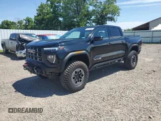 ✅ 2023 GMC Canyon 4WD AT4X • VIN: 1GTP6EEK4P1228687 • Лот: 62557605. Опубликован ранее на Copart с пробегом 20 168 миль. Бесплатный доступ к архиву аукционных продаж из США и подробный отчёт об истории автомобиля на DreamBid. Изображение 1.