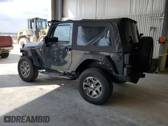 ✅ 2016 Jeep Wrangler Willys Wheeler • VIN: 1C4AJWAGXGL295231 • Lot: 81002325. Listed on Copart with 77,979 mi. Free auction sales archive from the USA and detailed vehicle history report at DreamBid. Image 2.