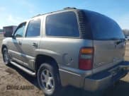 ✅ 2002 GMC Yukon Denali • VIN: 1GKEK63UX2J323023 • Lot: 43787393. Listed on IAAI with 184,795 mi. Free auction sales archive from the USA and detailed vehicle history report at DreamBid. Image 3.