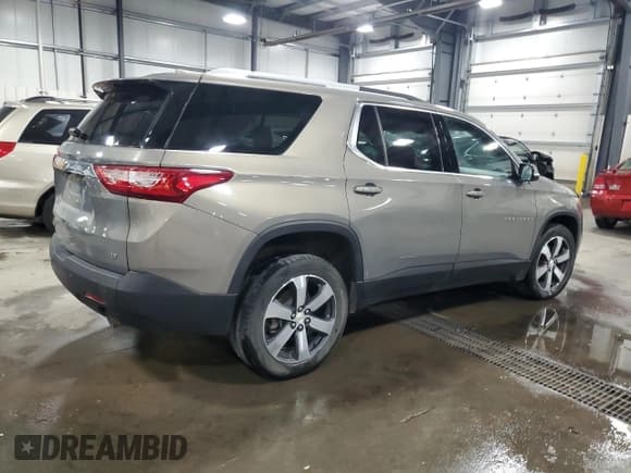 ✅ 2018 Chevrolet Traverse LT • VIN: 1GNEVHKW7JJ112143 • Lot: 81086695. Listed on Copart with 199,471 mi. Free auction sales archive from the USA and detailed vehicle history report at DreamBid. Image 3.