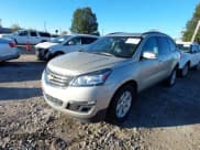 ✅ 2014 Chevrolet Traverse LT • VIN: 1GNKRHKD0EJ113596 • Lot: 43534806. Listed on IAAI with 137,655 mi. Free auction sales archive from the USA and detailed vehicle history report at DreamBid. Image 2.