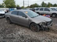 ✅ 2010 Chevrolet Malibu 1LS • VIN: 1G1ZB5EB6AF302909 • Lot: 71621174. Listed on Copart with 105,011 mi. Free auction sales archive from the USA and detailed vehicle history report at DreamBid. Image 4.