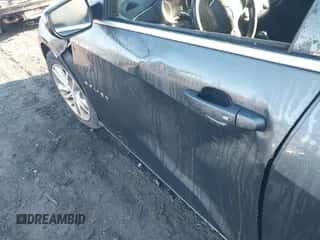 2018 Chevrolet Malibu LT with VIN 1G1ZD5ST7JF233140, listed as a IAAI auction lot 43377163 with 98,435 mi miles and . Bid and sale history available at DreamBid. Image 6.