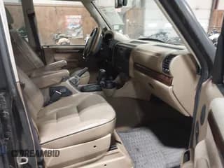 ✅ 2000 Land Rover Discovery Cloth • VIN: SALTY1543YA270698 • Лот: 43653370. Опубликован ранее на IAAI с пробегом 152 936 миль. Бесплатный доступ к архиву аукционных продаж из США и подробный отчёт об истории автомобиля на DreamBid. Изображение 5.
