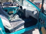 ✅ 1993 Geo Metro • VIN: 2C1MR2463P6718691 • Lot: 41797142. Listed on IAAI with 232,600 mi. Free auction sales archive from the USA and detailed vehicle history report at DreamBid. Image 5.