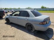 ✅ 2005 Mitsubishi Lancer ES • VIN: JA3AJ26E65U054420 • Lot: 52206935. Listed on Copart with 187,277 mi. Free auction sales archive from the USA and detailed vehicle history report at DreamBid. Image 2.