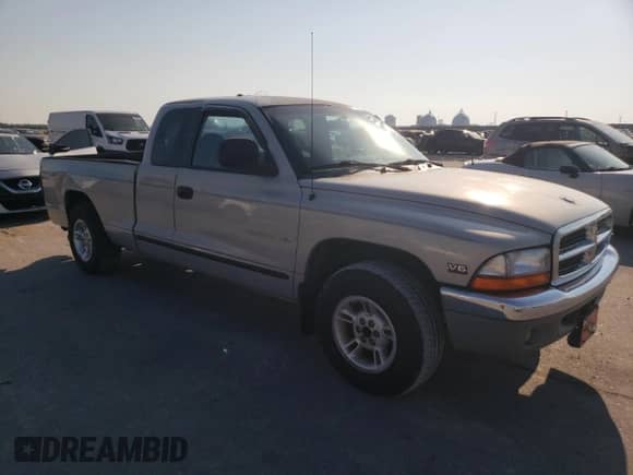 1999 Dodge Dakota SLT z VIN 1B7GL22X0XS315391, wystawiony jako Copart lot #75209904 z przebiegiem 181 336 mil mil oraz Szkoda całkowita • Salvage title. Historia ofert i sprzedaży dostępna na DreamBid. Obrazek 4.