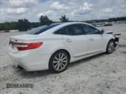 ✅ 2013 Hyundai Azera • VIN: KMHFH4JG8DA310835 • Лот: 68177595. Опубликован ранее на Copart с пробегом 165 253 миль. Бесплатный доступ к архиву аукционных продаж из США и подробный отчёт об истории автомобиля на DreamBid. Изображение 3.