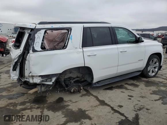 ✅ 2020 Chevrolet Tahoe LT • VIN: 1GNSKBKCXLR279650 • Lot: 78522203. Listed on Copart with 107,250 mi. Free auction sales archive from the USA and detailed vehicle history report at DreamBid. Image 3.