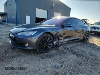 ✅ 2014 Tesla Model S P85D • VIN: 5YJSA1H26EFP62856 • Lot: 90639915. Listed on Copart with 143,375 mi. Free auction sales archive from the USA and detailed vehicle history report at DreamBid. Image 1.