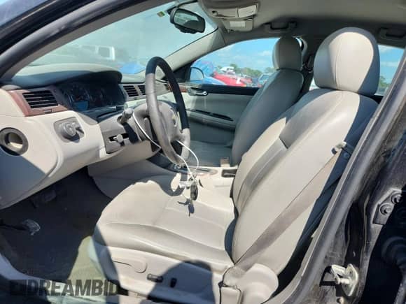 2007 Chevrolet Impala LTZ z VIN 2G1WU58R679149732, wystawiony jako Copart lot #63986115 z przebiegiem 203 659 mil mil oraz Szkoda całkowita • Salvage title. Historia ofert i sprzedaży dostępna na DreamBid. Obrazek 7.