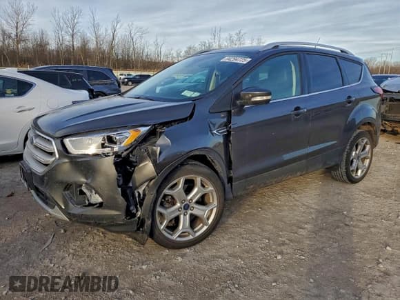 ✅ 2019 Ford Escape Titanium • VIN: 1FMCU9J98KUB22874 • Lot: 94294725. Wystawiony na Copart z przebiegiem 31 501 mil. Bezpłatny archiwum sprzedaży aukcyjnych z USA i szczegółowy raport historii pojazdu na DreamBid. Zdjęcie 1.
