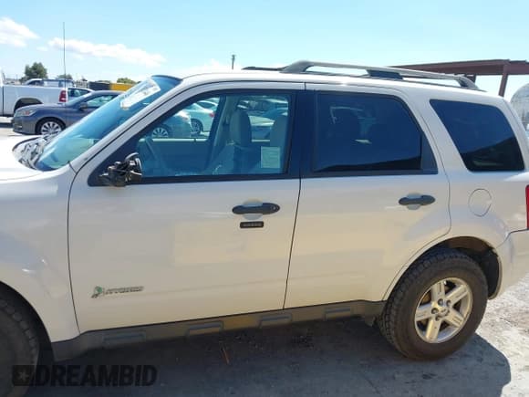 ✅ 2011 Ford Escape Hybrid • VIN: 1FMCU4K33BKB91464 • Lot: 43121446. Wystawiony na IAAI z przebiegiem 128 342 mil. Bezpłatny archiwum sprzedaży aukcyjnych z USA i szczegółowy raport historii pojazdu na DreamBid. Zdjęcie 14.