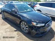 ✅ 2014 Audi A6 Prestige • VIN: WAUHGAFC9EN027338 • Lot: 42377190. Listed on IAAI with 164,427 mi. Free auction sales archive from the USA and detailed vehicle history report at DreamBid. Image 1.