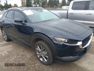 ✅ 2024 Mazda CX-30 S Premium • VIN: 3MVDMBDMXRM715407 • Lot: 43704283. Listed on IAAI with 19,366 mi. Free auction sales archive from the USA and detailed vehicle history report at DreamBid. Image 1.