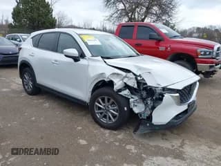 ✅ 2023 Mazda CX-5 S Carbon Edition • VIN: JM3KFBCM8P0187510 • Лот: 42628848. Опубликован ранее на IAAI с пробегом 42 972 миль. Бесплатный доступ к архиву аукционных продаж из США и подробный отчёт об истории автомобиля на DreamBid. Изображение 1.