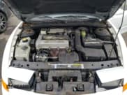 ✅ 1995 Saturn 2dr Coupe • VIN: 1G8ZH127XSZ326509 • Лот: 77352434. Опубликован ранее на Copart с пробегом 108 990 миль. Бесплатный доступ к архиву аукционных продаж из США и подробный отчёт об истории автомобиля на DreamBid. Изображение 11.