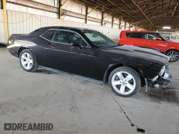 ✅ 2013 Dodge Challenger SXT • VIN: 2C3CDYAG2DH620026 • Lot: 42370555. Wystawiony na Copart z przebiegiem 117 987 mil. Bezpłatny archiwum sprzedaży aukcyjnych z USA i szczegółowy raport historii pojazdu na DreamBid. Zdjęcie 4.