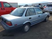 ✅ 1989 Toyota Corolla • VIN: 1NXAE92E3KZ056489 • Lot: 43050822. Wystawiony na IAAI z przebiegiem 77 045 mil. Bezpłatny archiwum sprzedaży aukcyjnych z USA i szczegółowy raport historii pojazdu na DreamBid. Zdjęcie 4.