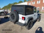 ✅ 2023 Jeep Wrangler Sport • VIN: 1C4GJXAG3PW699468 • Lot: 43322114. Listed on IAAI with 40,778 mi. Free auction sales archive from the USA and detailed vehicle history report at DreamBid. Image 4.