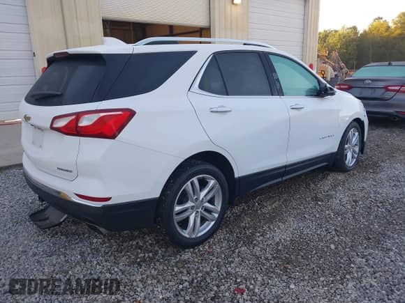 2020 Chevrolet Equinox Premier with VIN 3GNAXPEX7LS719569, listed as a IAAI auction lot 43479451 with 36,680 mi miles and . Bid and sale history available at DreamBid. Image 4.