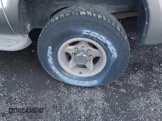 ✅ 2000 Ford Excursion Limited • VIN: 1FMNU43S2YEB35604 • Lot: 43782604. Listed on IAAI with 16,521 mi. Free auction sales archive from the USA and detailed vehicle history report at DreamBid. Image 6.