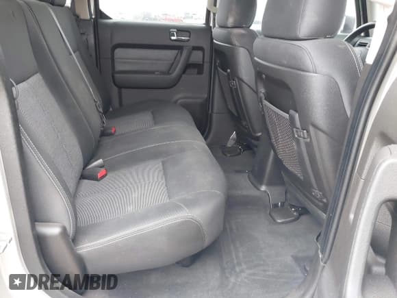 ✅ 2009 Hummer H3 H3T Luxury • VIN: 5GNEN13E898124200 • Lot: 42044686. Wystawiony na IAAI z przebiegiem 109 728 mil. Bezpłatny archiwum sprzedaży aukcyjnych z USA i szczegółowy raport historii pojazdu na DreamBid. Zdjęcie 8.